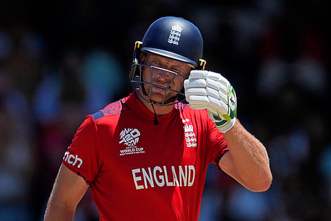 Jos Buttler reacts after scoring fifty runs